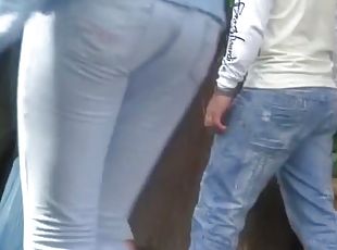 Cute Latina flaunts her butt in tight jeans before a spy cam