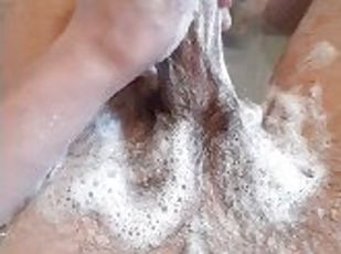 Extremely horny teen washes his dirty cock with shampoo in the bathtub