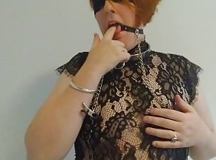 Redhead lingerie playing with her nipples and ring gag