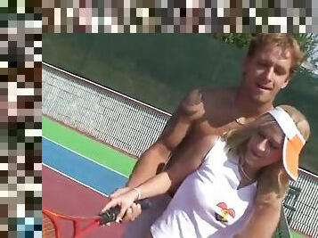 Horny couple has sex in an outdoor tennis court