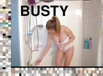 Busty babe getting naked in the shower