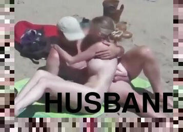 Beautiful bitch groped by his husband and strangers at beach