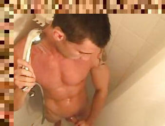 Hot handsome jock wanks his huge dick in a shower (after workout).