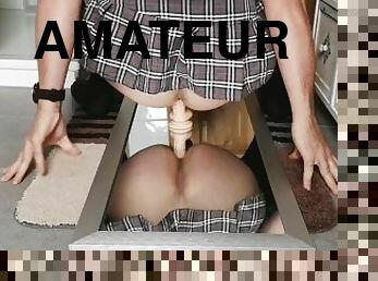 Sissy riding her favorite dildo wearing a lovely short schoolgirl skirt