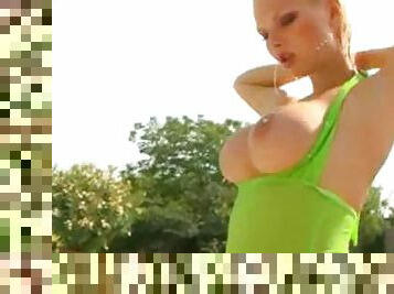 Big tits Tarra White teases us outdoors