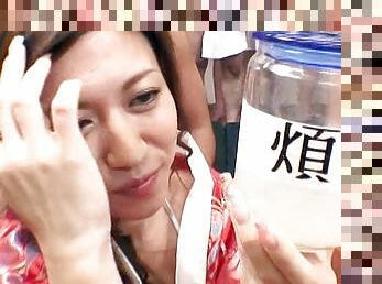 Japanese cutie is swallowing sperm from bottle