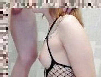 Sexy slut in fishnet sucking his big dick deep