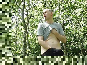 Kudoslong is outside in the woods in just a gray t-shirt and black boxers, he strips naked and masturbates