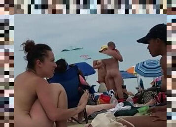 A man on a naturist beach cumshot