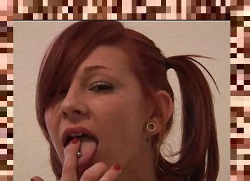 Pierced redhead loves talking dirty to the camera