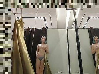 Trying on mini dresses and sexy clothes in a mall. Look at me in the fitting room and jerk,I like it