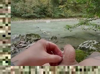 In nature, jerking off his big sinewy dick to a shaking orgasm and huge sperm