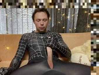 The super hero jerked off his big fat cock