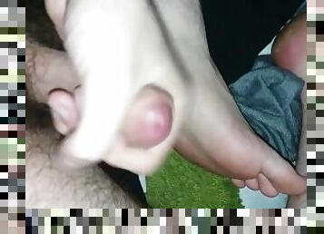 Jerking-off with my foot. Cumshot on my soles