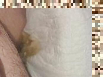 Abdl ftm boy wets nappy and piss leaks down leg (pool of piss)