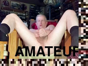 Daddy masturbating, legs up with bare feet.