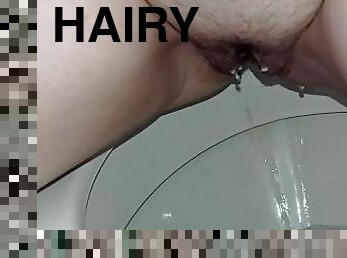 schoolgirl urinating with hairy pussy