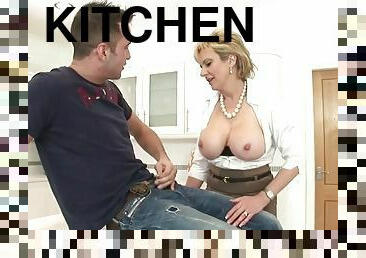 Lady sonia jerks off young stud on kitchen counter