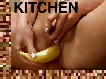 Beautiful bitch Olivia La Roche masturbates on the kitchen with banana