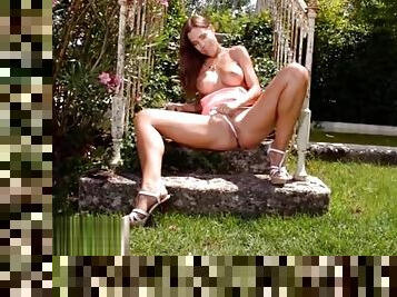 Insatiable Czech beauty Satin Bloom fucks herself good in the garden