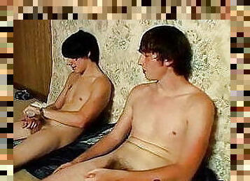 Two skinny straight thugs jerk off together and cum