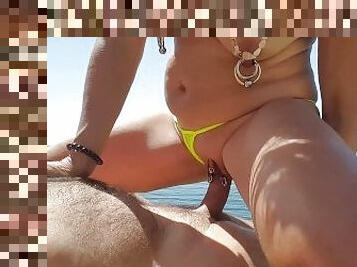 nippleringlover outside nacked riding hubby`s cock - pulling double nipple rings - next to the sea