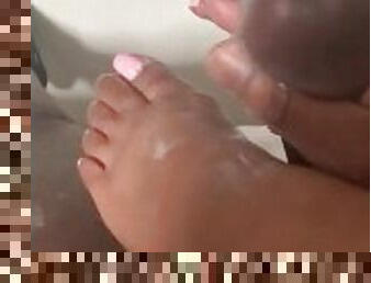 Cumming on pretty ebony toes