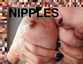 Sucking puffy nipples close up