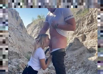 gave his cock in the mouth of a beautiful blonde outdoors in a canyon