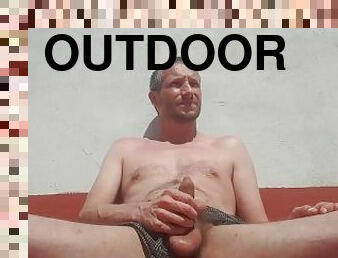 Sunbathing Outside And Wanking