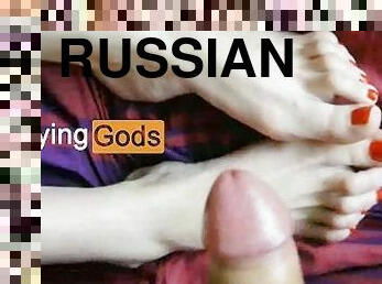 Russian girl with beautiful legs doing footjob and playing with sperm - PlayingGods