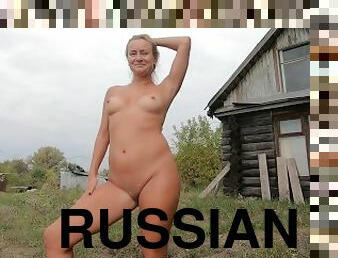 Naked girl in a Russian village