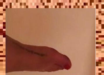 Dirty feet in the shower ready for washing