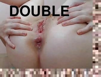 Cutie squirts from double penetration dildo - close up