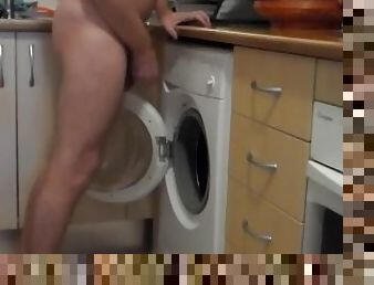 John is Peeing all into the Washing Machine