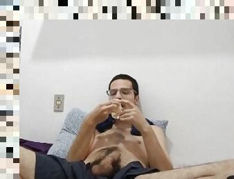 fat gainer feeding with a small cake while wanking his cock