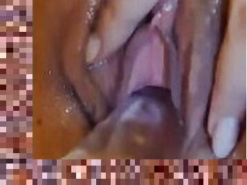 Student masturbates her tight pussy with a big dildo until she squirts