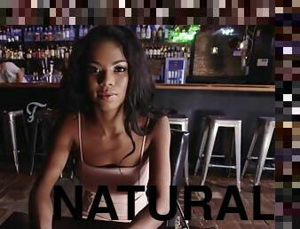 Natural busty black babe fucks in the bar