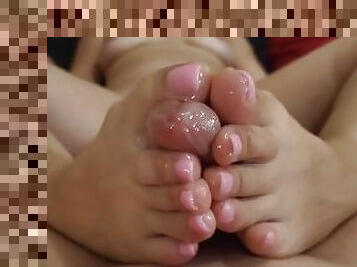 Mind blowing MILF footjob covering toes with CUM
