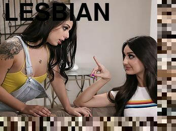 Gina Valentina and Eliza Ibarra playing lesbian games on the couch