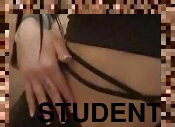 A slutty student touches her beautiful breasts.