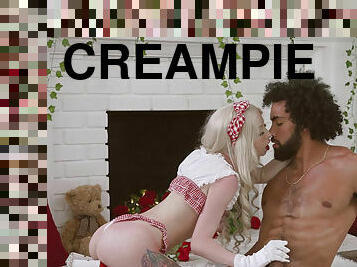 Blonde doll Kenzie Reeves in a loli outfit gets a dripping creampie by the fireplace