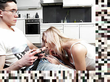 Tall chick Anna Krowe distracts her bf from video games