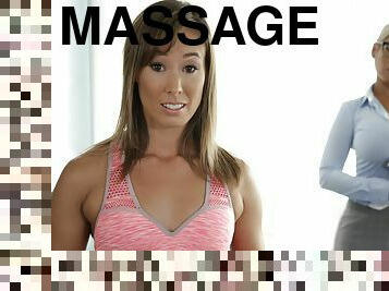Bridgette B and Christy Love licking passionately on the massage table