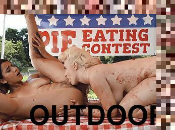 Kate Dee and Roxie Sinner licking wildly outdoors