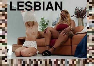 A petite lesbian satisfies a black mama with a huge thick ass