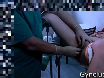 Full gynecological examination of a girl on a gynecological chair