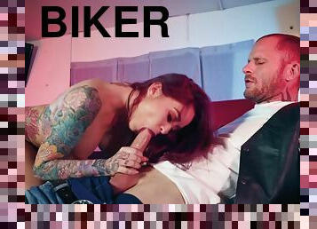 Tattooed floozy Monique Alexander takes a hard fucing from a biker