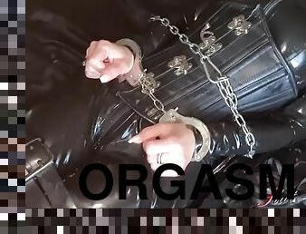 Slave Slut-Orgasma Celeste restrained in latex and leather