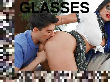 Dark-haired cutie in glasses gives lad access to her holes